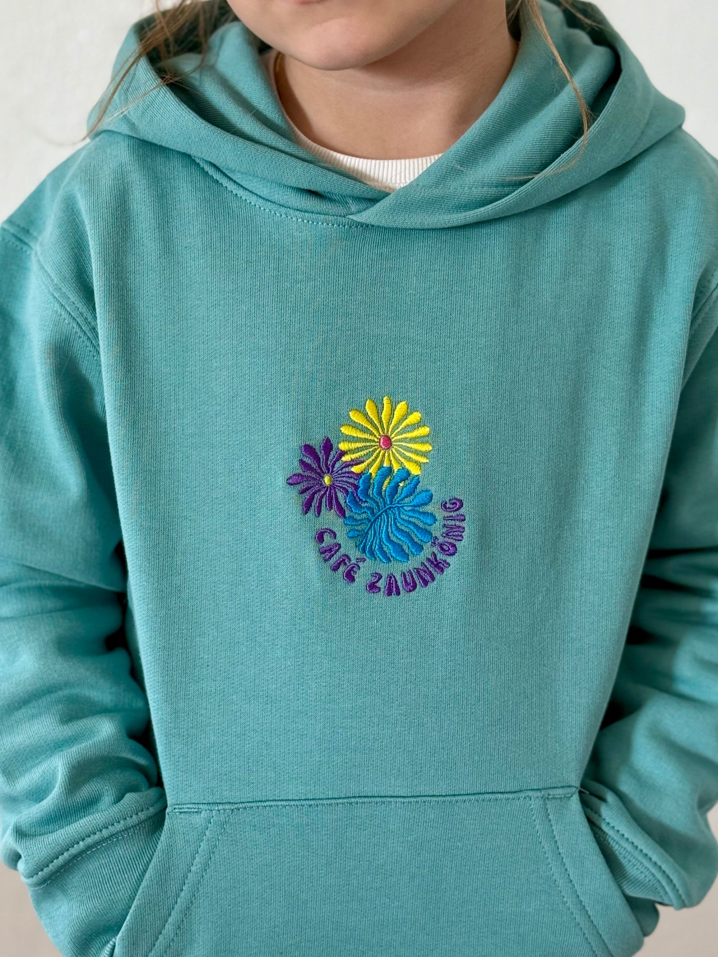 Kids Hoodie „Flower Café Zaunkönig“ Teal Monstera